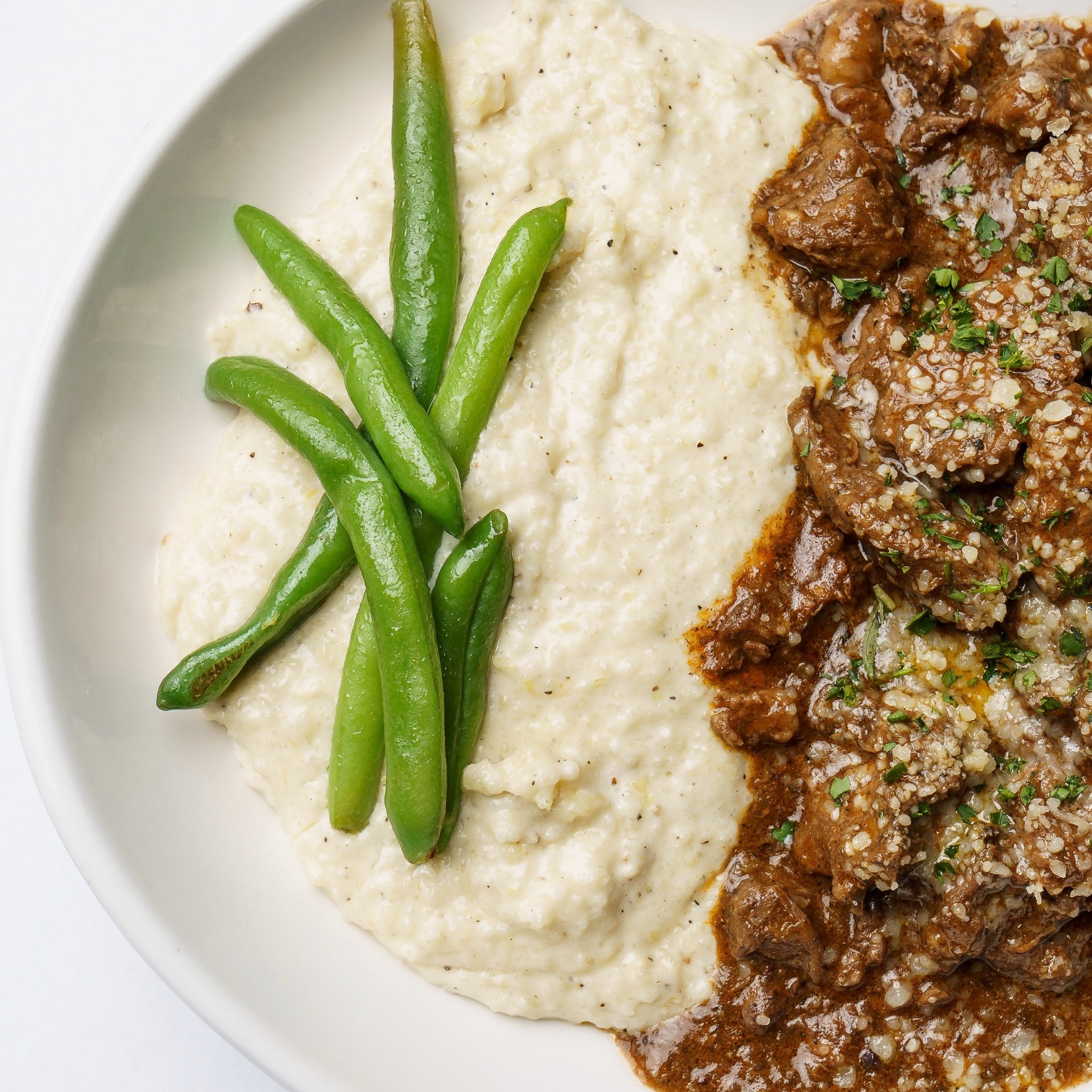 Beef Tips & Grits.